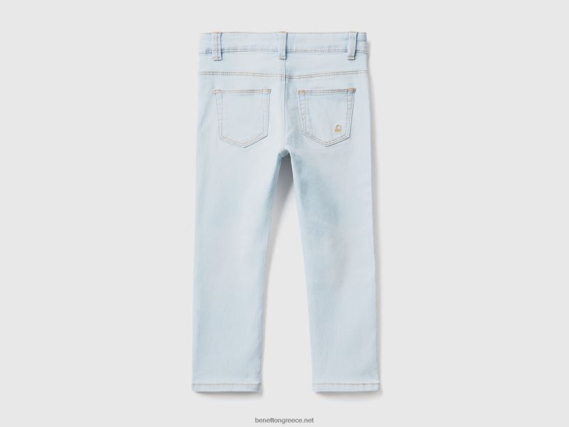τζιν με λεπτή εφαρμογή με πέντε τσέπες J8TLD3048 Benetton παιδιά μπλε του ουρανού
