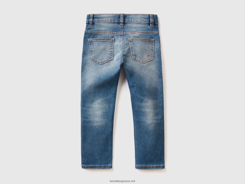 τζιν με λεπτή εφαρμογή με πέντε τσέπες J8TLD5725 Benetton παιδιά σκούρο μπλε